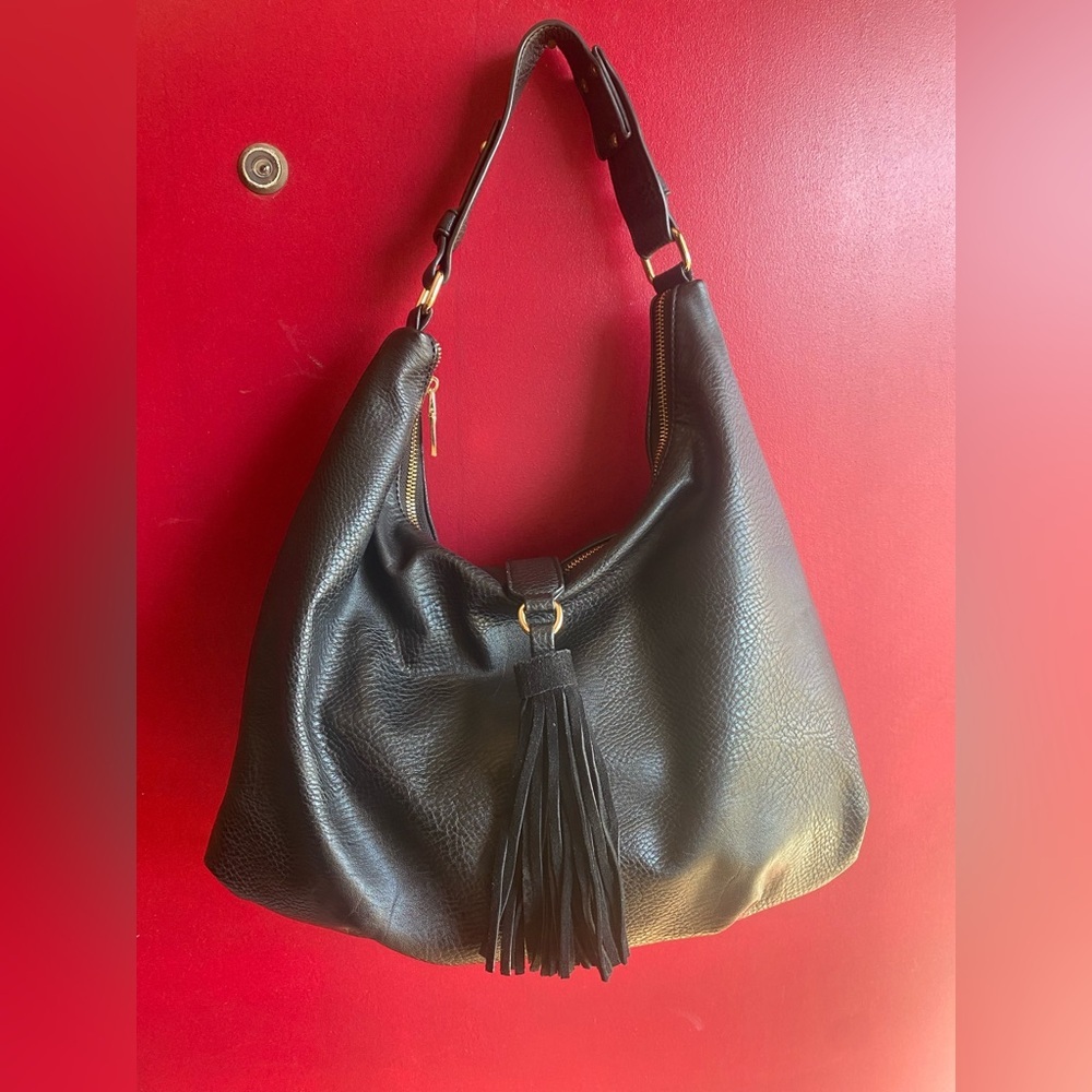 Stylish Sole Society Black Vegan Hobo with Tassel and gold accents like new